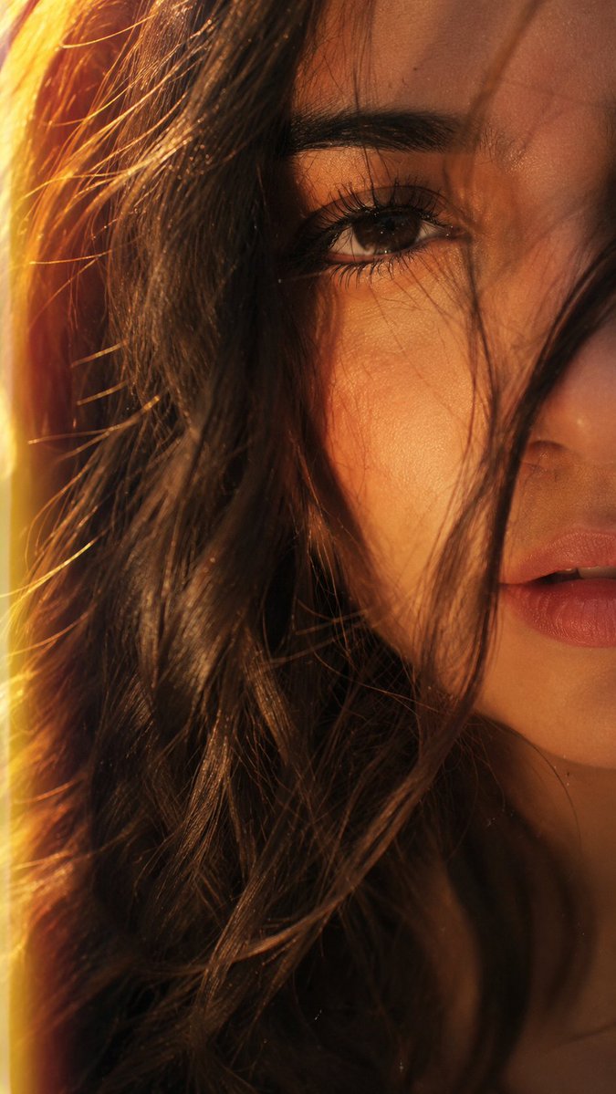Create an ultra-realistic cinematic close-up portrait while