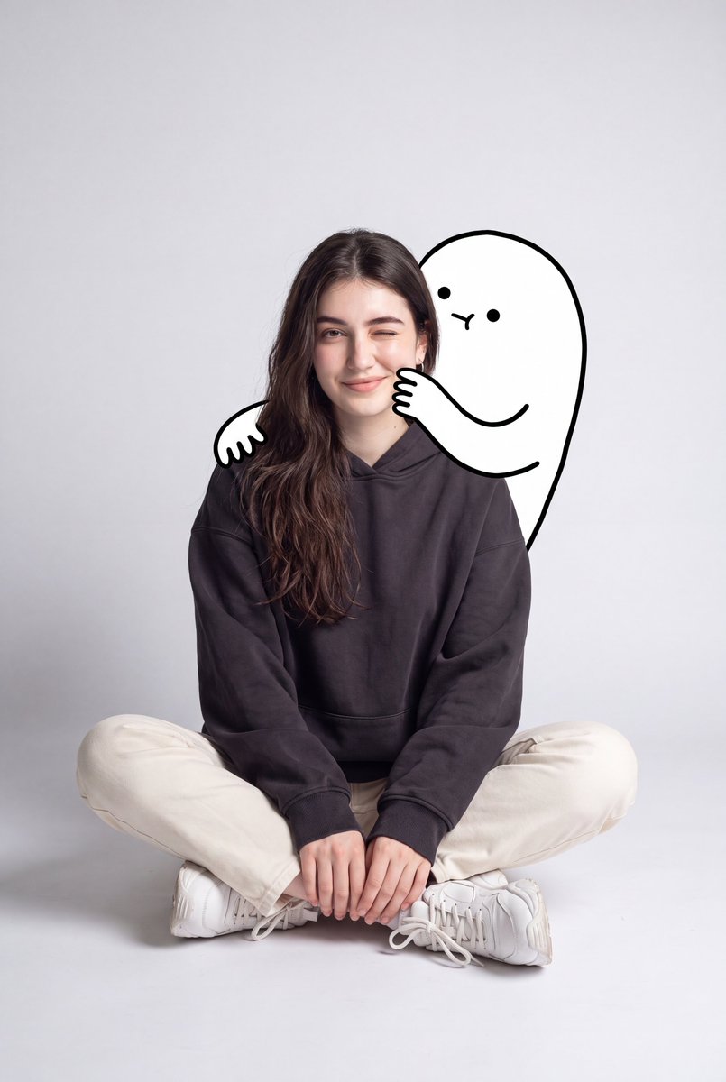 A cute minimalist portrait of a young woman sitting casually